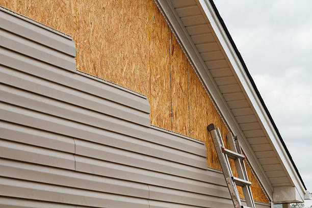 Professional Siding technician working in Onley, VA